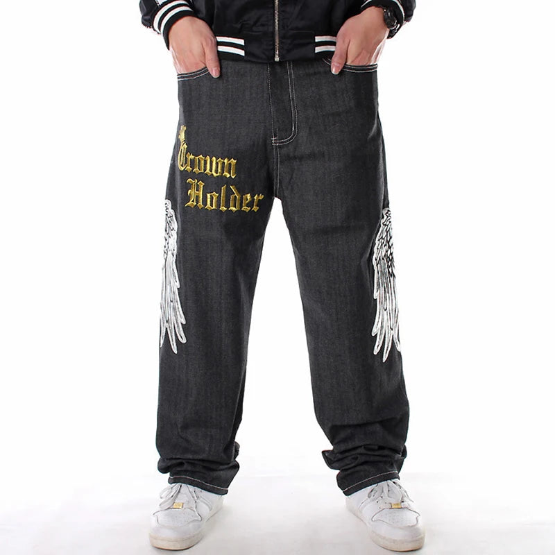 Jean hip hop homme baggy | Pantalon streetwear ample | Jean grande taille homme | Jean baggy motif tête de mort | Jean ailes de faucon homme | Jean couronne et lettres | Jean streetwear grande taille | Jean mode homme décontracté | Jean graphique homme ample | Jean hip hop tête de mort