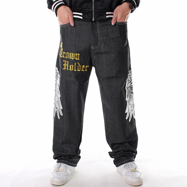 Jean hip hop homme baggy | Pantalon streetwear ample | Jean grande taille homme | Jean baggy motif tête de mort | Jean ailes de faucon homme | Jean couronne et lettres | Jean streetwear grande taille | Jean mode homme décontracté | Jean graphique homme ample | Jean hip hop tête de mort