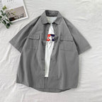 Chemise homme été manches courtes | Chemise homme couleurs bonbon | Chemise homme couple décontractée | Chemise col rabattu homme | Chemise homme poches simples | Chemise loose été homme | Chemise Harajuku homme mode | Chemise unie homme tendance | Chemise été homme fashion | Chemise ample colorée homme