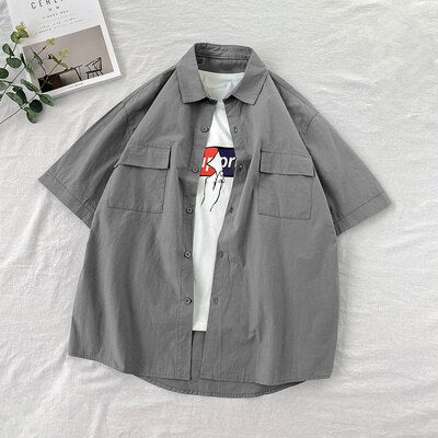 Chemise homme été manches courtes | Chemise homme couleurs bonbon | Chemise homme couple décontractée | Chemise col rabattu homme | Chemise homme poches simples | Chemise loose été homme | Chemise Harajuku homme mode | Chemise unie homme tendance | Chemise été homme fashion | Chemise ample colorée homme