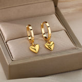 Boucles d’oreilles cœur femme | Boucles d’oreilles vintage or | Boucles cœur acier inoxydable | Bijoux femme cœur doré | Boucles d’oreilles mariage | Boucles d’oreilles Saint-Valentin | Bijoux cœur pendantes femme | Boucles d’oreilles cadeau femme | Boucles d’oreilles amour or | Bijoux vintage cœur femme
