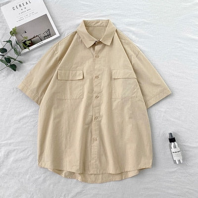 Chemise homme été manches courtes | Chemise homme couleurs bonbon | Chemise homme couple décontractée | Chemise col rabattu homme | Chemise homme poches simples | Chemise loose été homme | Chemise Harajuku homme mode | Chemise unie homme tendance | Chemise été homme fashion | Chemise ample colorée homme
