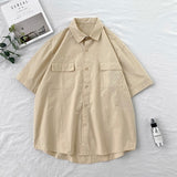 Chemise homme été manches courtes | Chemise homme couleurs bonbon | Chemise homme couple décontractée | Chemise col rabattu homme | Chemise homme poches simples | Chemise loose été homme | Chemise Harajuku homme mode | Chemise unie homme tendance | Chemise été homme fashion | Chemise ample colorée homme